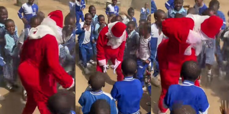 PHOTO: Lady dresses as father Christmas to make pupils inform their parents about party fees