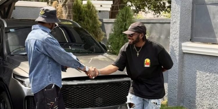 Slimcase in cloud nine as D’banj gifts him new car [Watch Video]